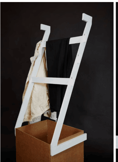 Foam-core prototype of the Z-frame with clothes hung during testing