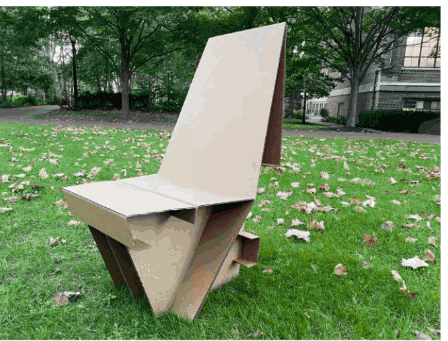 Cardboard lounge chair prototype on a lawn